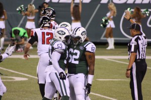 Leonard Williams (R) celebrates a sack with Linebacker Joe Mays.