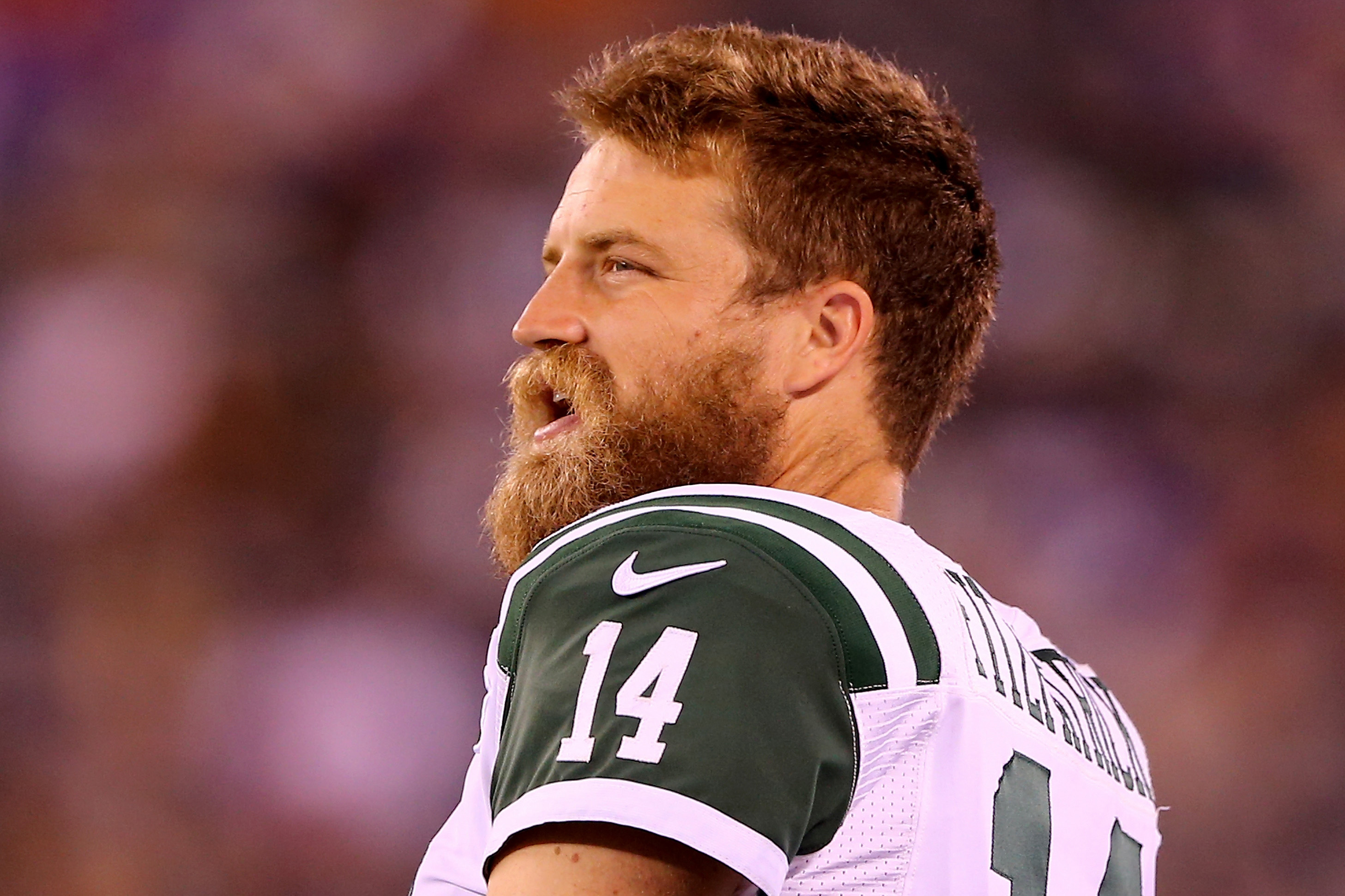 EAST RUTHERFORD, NJ - AUGUST 29:  Ryan Fitzpatrick #14 of the New York Jets looks on from the bench in the fourth quarter against the New York Giants during preseason action at MetLife Stadium on August 29, 2015 in East Rutherford, New Jersey.  (Photo by Elsa/Getty Images)