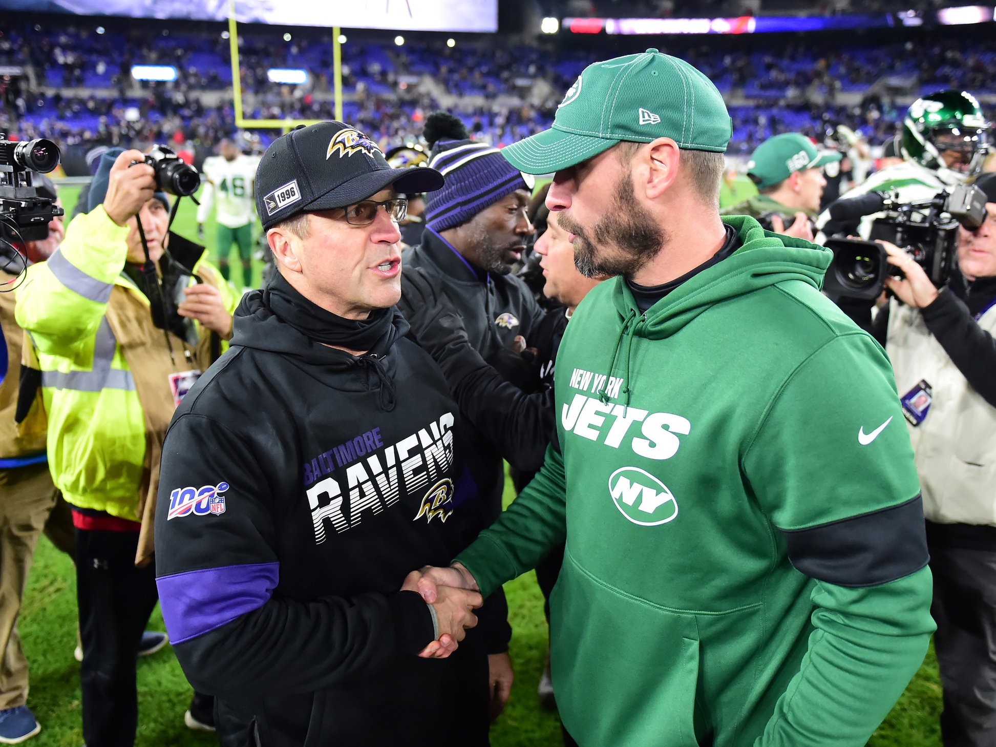 John Harbaugh, Adam Gase