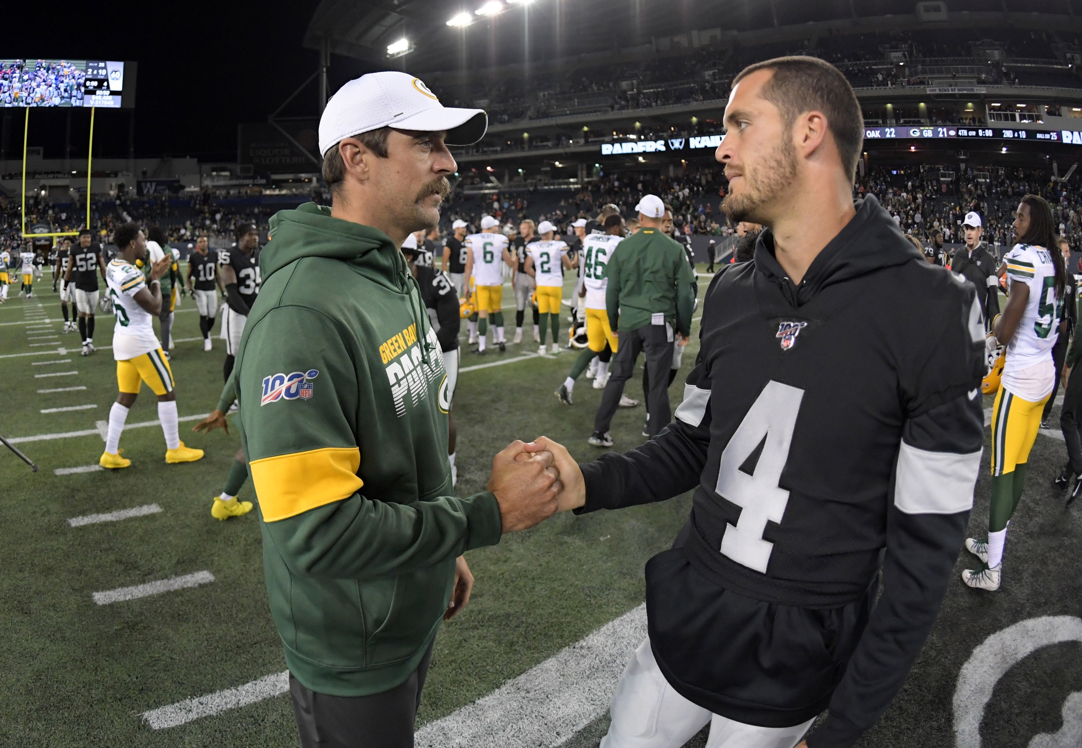 NFL: Preseason-Green Bay Packers at Oakland Raiders - JetNation.com - New York Jets Blog & Forum Derek Carr, Aaron Rodgers